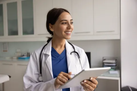 nurse practitioner with clipboard