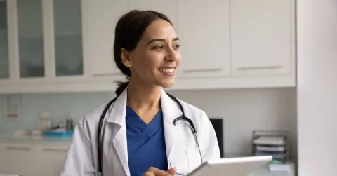 nurse practitioner (NP) student with laptop